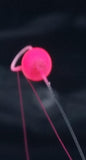 Close-up of an Ice Strong Titanium Spring Bobber Original Pretty Pink